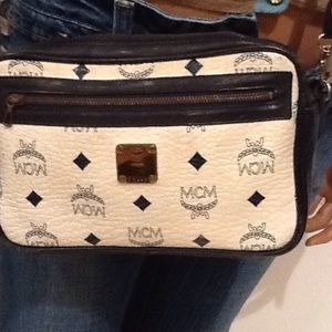 Priced to sell: Vintage MCM navy and white handbag